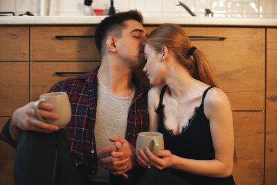 This is an image of a person kissing their partner on the forehead. This image could depict a c couple who is in need of affair recovery in atlanta, ga. get connected with online marriage counseling in Georgia today! 30024 | 30097