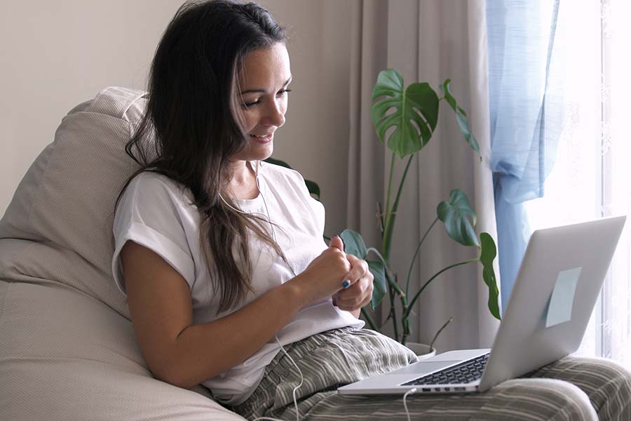 Young woman engaged in online counseling