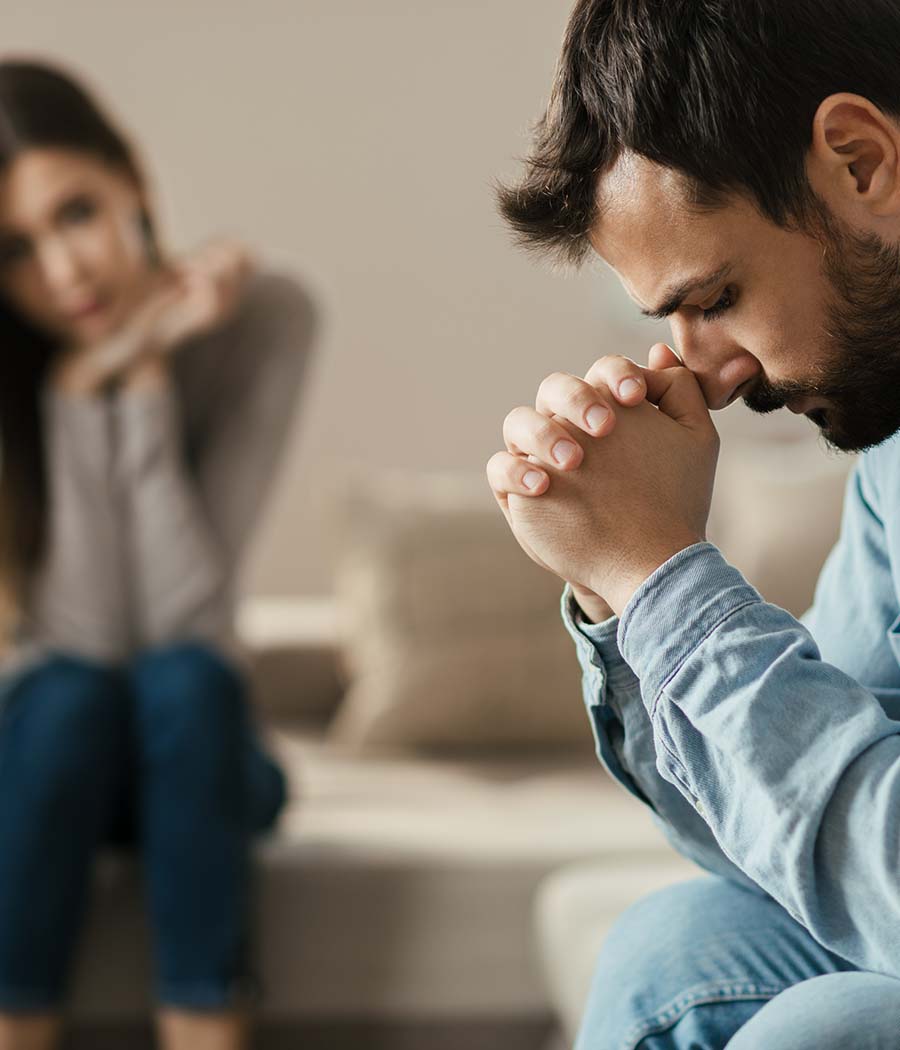 Image of a person with their fists touching their forehead. This partnership could benefit from marriage counseling in Atlanta, GA. Get connected with a Christian marriage counselor today. | 30518 | 30519