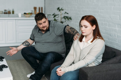 Photo of a man trying to talk to a woman who has turned away representing conflict that can happen in all relationships. Our couples therapists can help you navigate everyday stresses and conflicts in your marriage or relationship BEFORE it becomes a crisis.